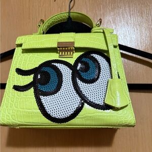 Chic Lime Green Crossbody Bag with Eye Design
